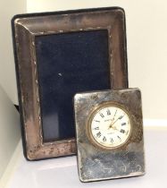 Silver H/M clock together with a silver H/M small photo frame