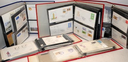 A large collection of Guernsey FDC's and addressed envelopes contained within 5 albums