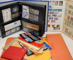 A well filled GB stamps stock book, an album of GB Presentation packs and FDC's