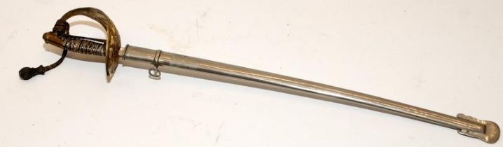Vintage letter opener in the form of a cavalry sword with metal scabbard