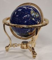 Contemporary gem set rotating globe of the world approx 35cm tall.