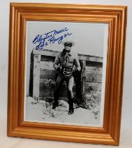 Clayton Moore The Lone Ranger signed photograph. Frame size 27cms x 33cms. Unauthenticated but