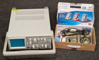 An LG Oscilloscope with power lead, probes and instructions.