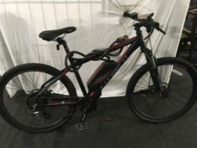 A Carrera red and black electric bicycle. (17)