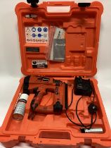 Paslode Impulse nail gun with battery and charger model No. IM65 F16. Complete with instruction