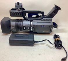 Sony DSR-PD150P Mini DV Camcorder Complete with charger and carry case. (Ref 39)