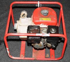 A red Clarke 6.5HP Pump. (43)