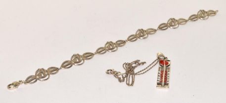 A Charles Rennie Macintosh enameled 925 silver pendant.