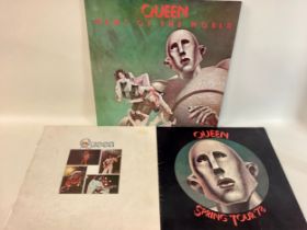 QUEEN VINYL ‘NEWS OF THE WORLD’ WITH 2 CONCERT PROGRAMMES. This gatefold sleeve album is found on