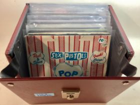 CARRY CASE OF VARIOUS PUNK 7” VINYL SINGLE RECORDS. To include Artist’s - The Jam - The Clash -