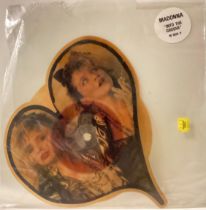 MADONNA HEART SHAPED PICTURE DISC SINGLE ‘INTO THE GROOVE’. This is from the film ‘Desperately