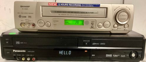 2 X VHS VIDEO PLAYERS. Here we have a Panasonic DMR-E749V combined VHS/DVD player and a Sharp VC-
