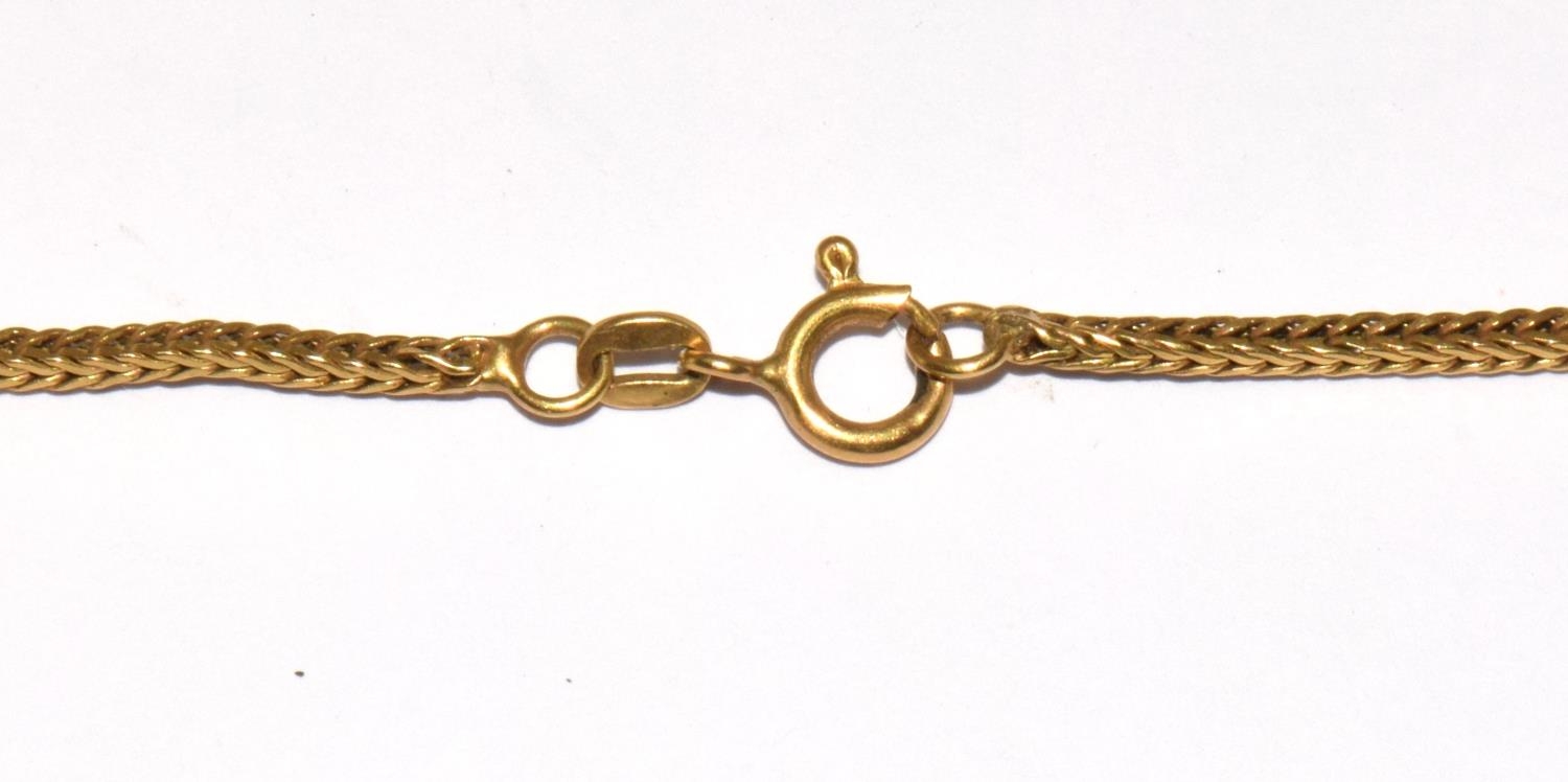 18ct gold neck chain together a 18ct gold pendant possibly Omani and a Chinese fob 19g total - Image 4 of 7