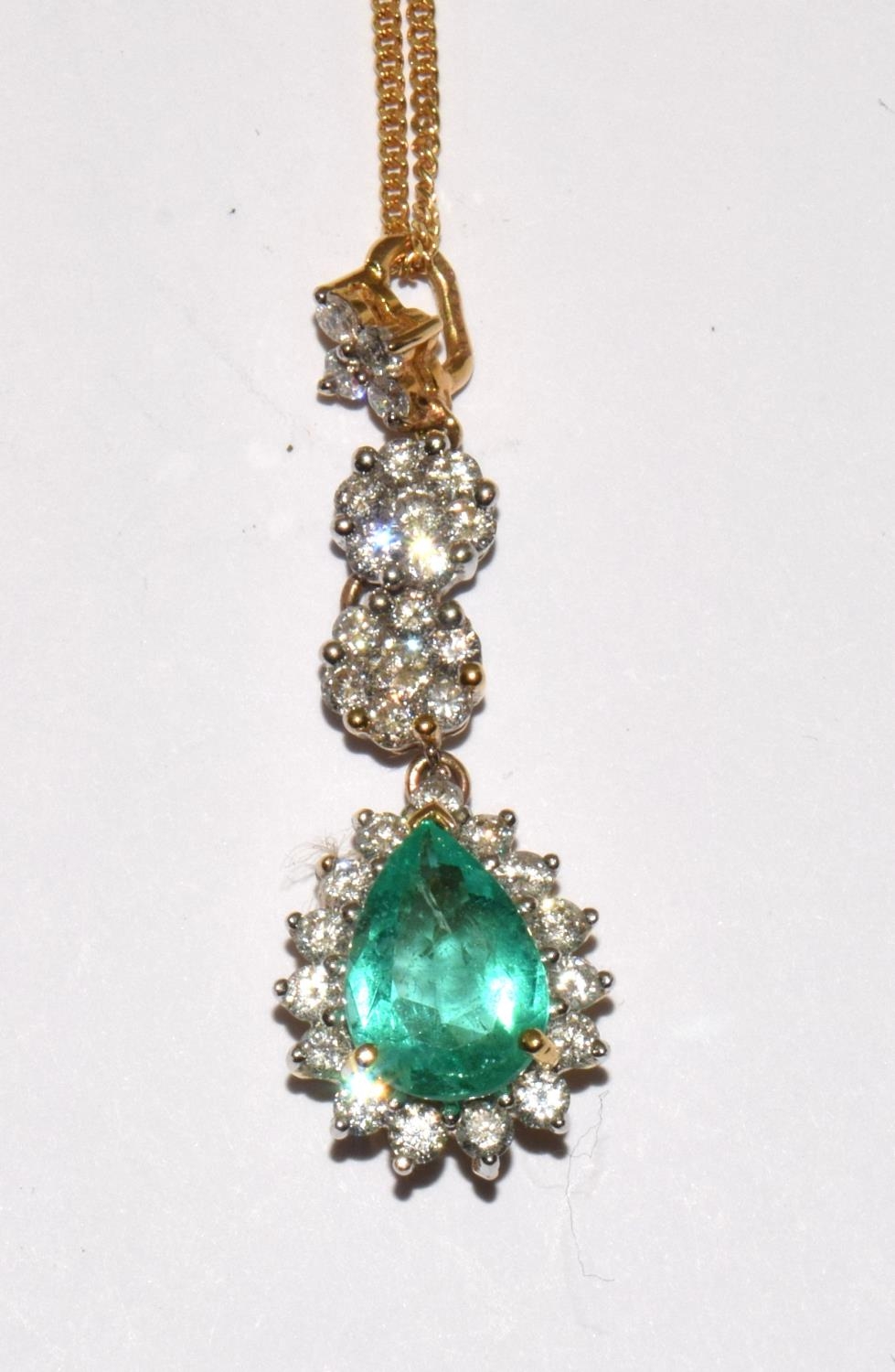 An 18ct gold emerald and diamond pendant on 18ct gold chain. (boxed) - Image 2 of 6