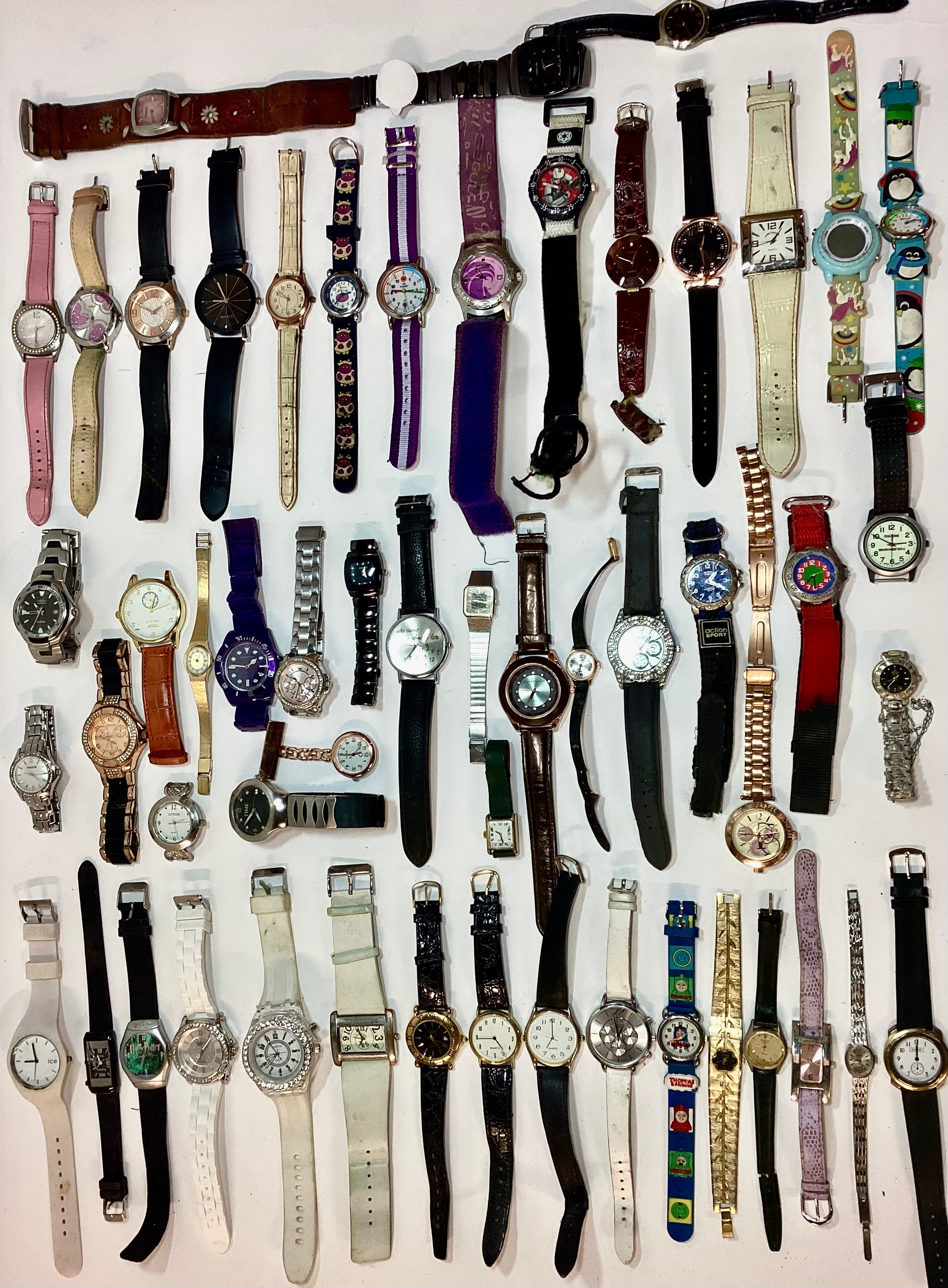 A large collection of ladies and kids wristwatches.