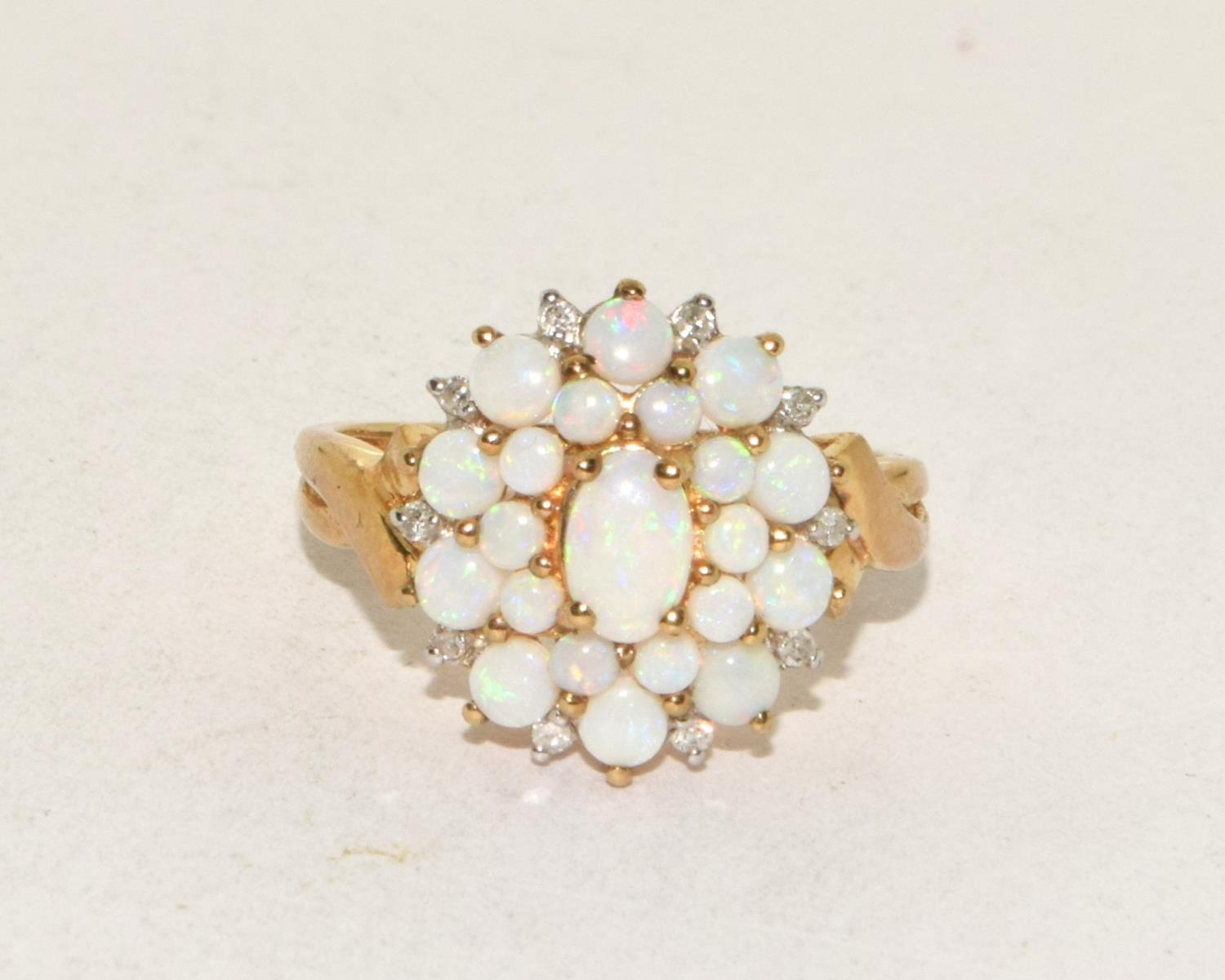 9ct gold ladies Opal and Diamond cluster ring in a good open work mount size N - Image 5 of 5