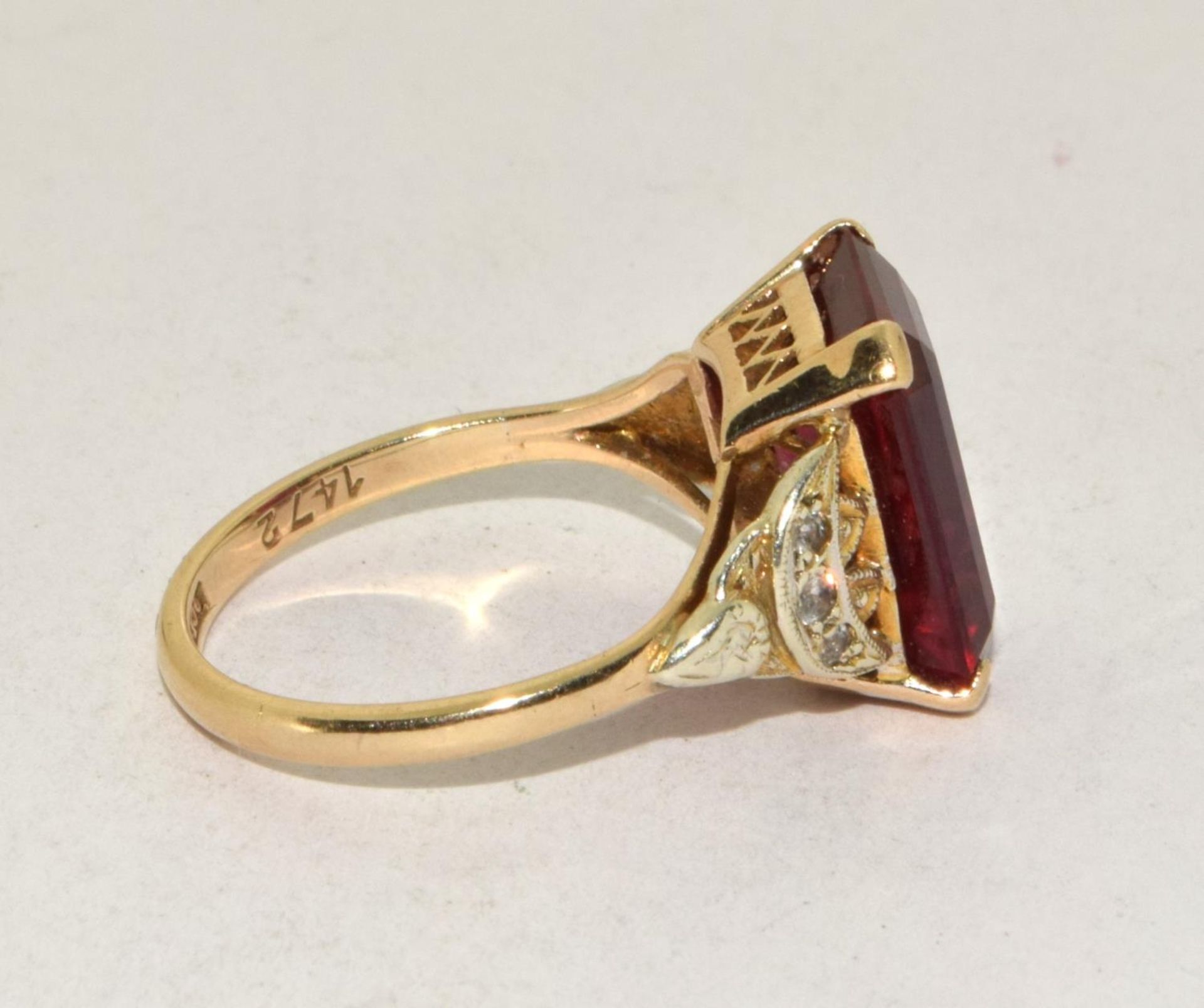 9ct gold ladies Large Ruby square set ring with diamonds to the shank set in an open work setting - Image 4 of 5