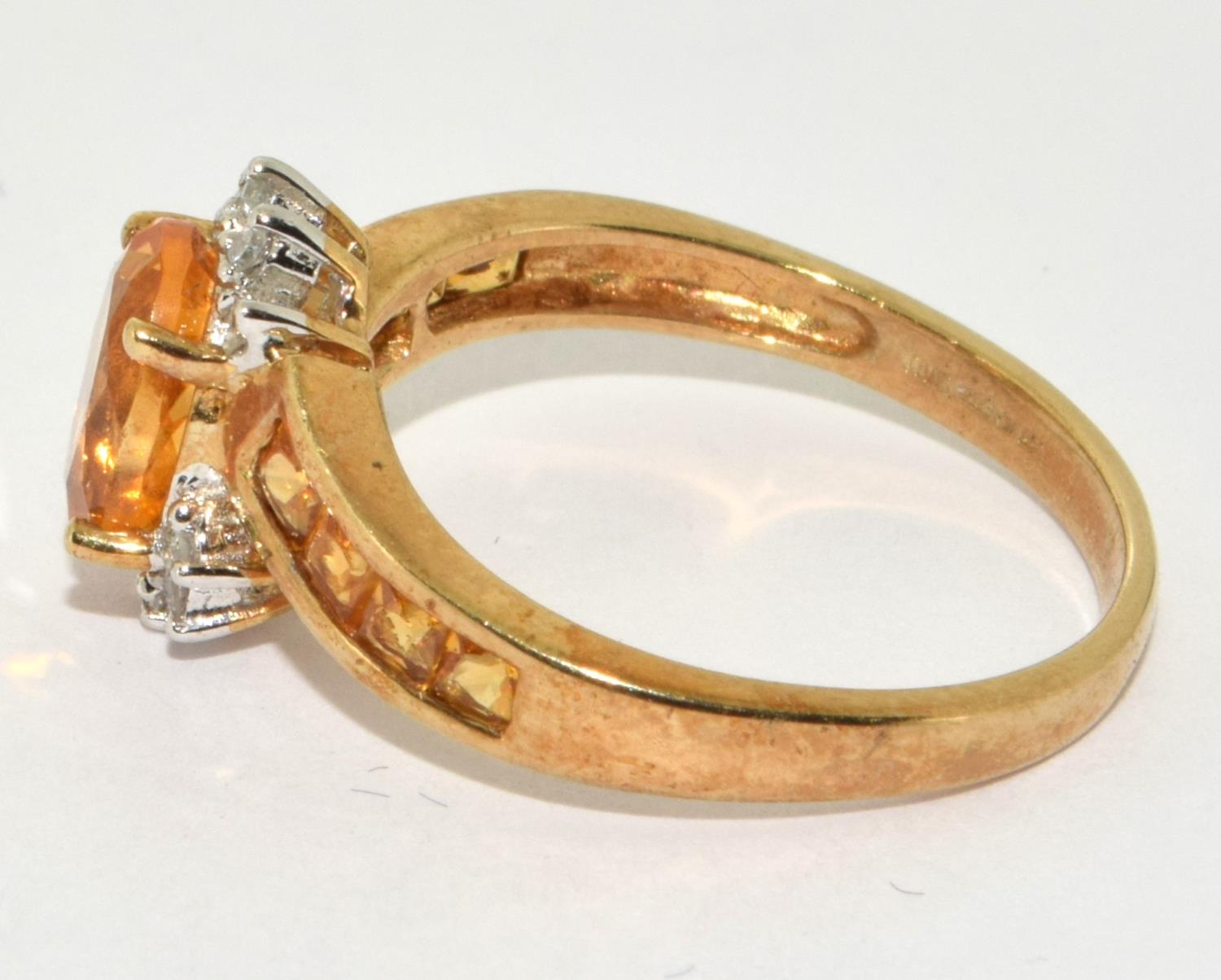 9ct gold ladies Diamond and Amber set ring with amber stones to the shank size P - Image 2 of 5