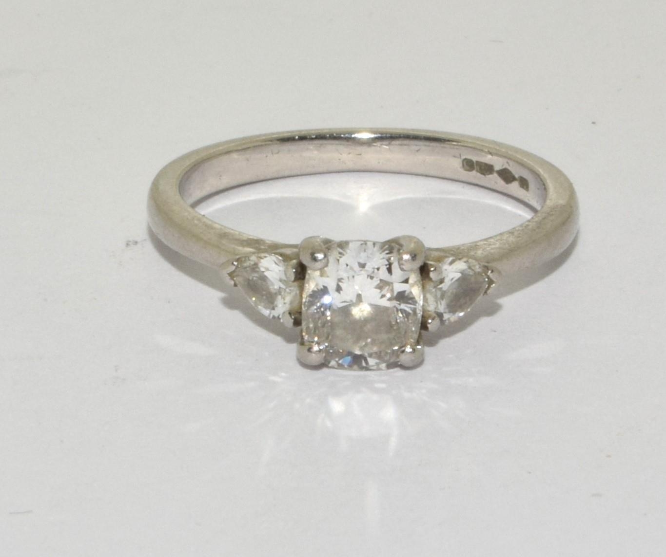 A Diamond solitaire with two side stones approx 0.80points set in a platinum ring, Boxed (Size M) - Bild 5 aus 5