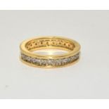 18ct gold and diamond eternity ring Size O, 4.7g