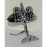 Unusual condiment set in the form of a jet aircraft