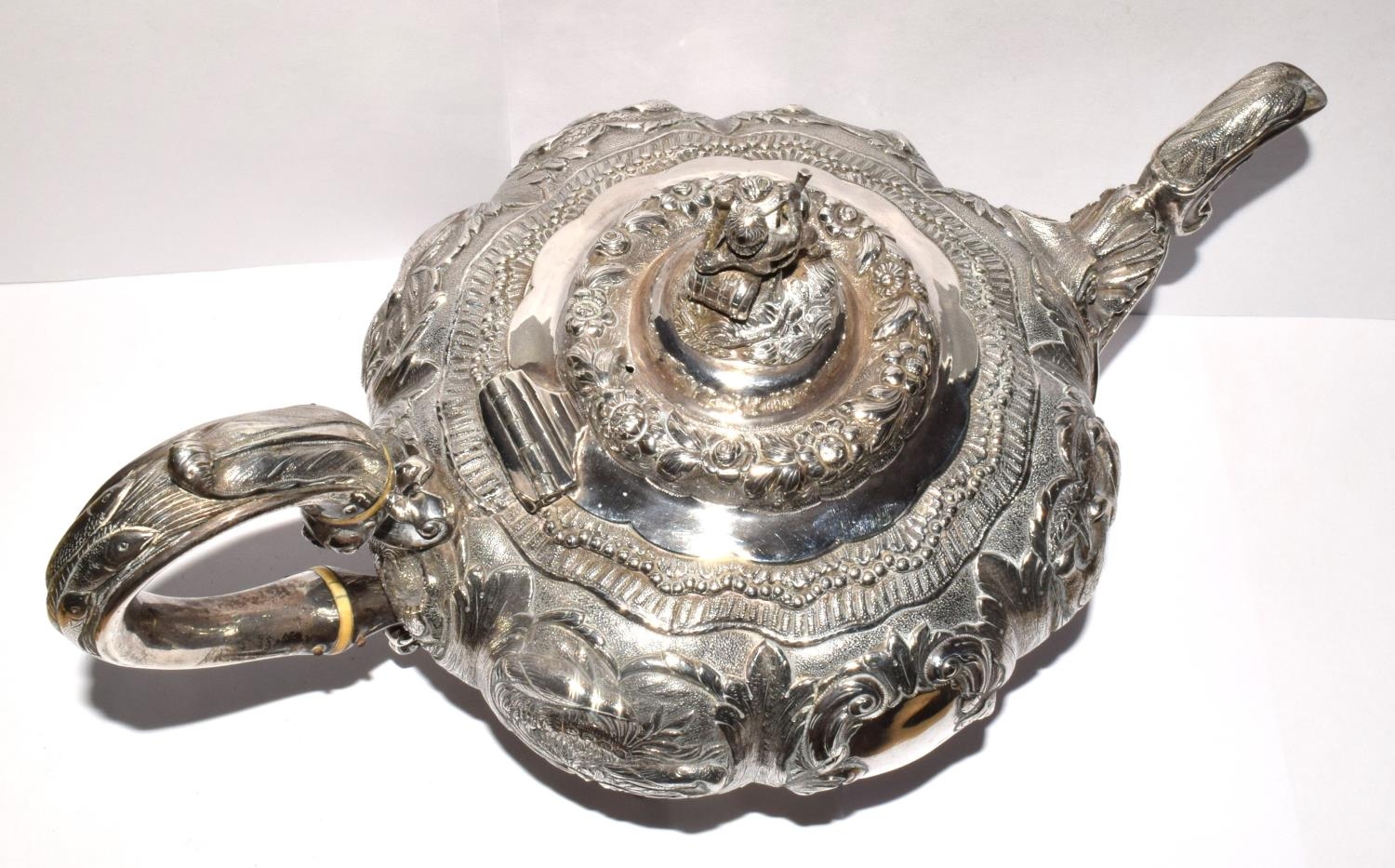 A superb example of a Georgian silver Tea pot heavily embossed with blank cartouche and surmounted - Image 11 of 11