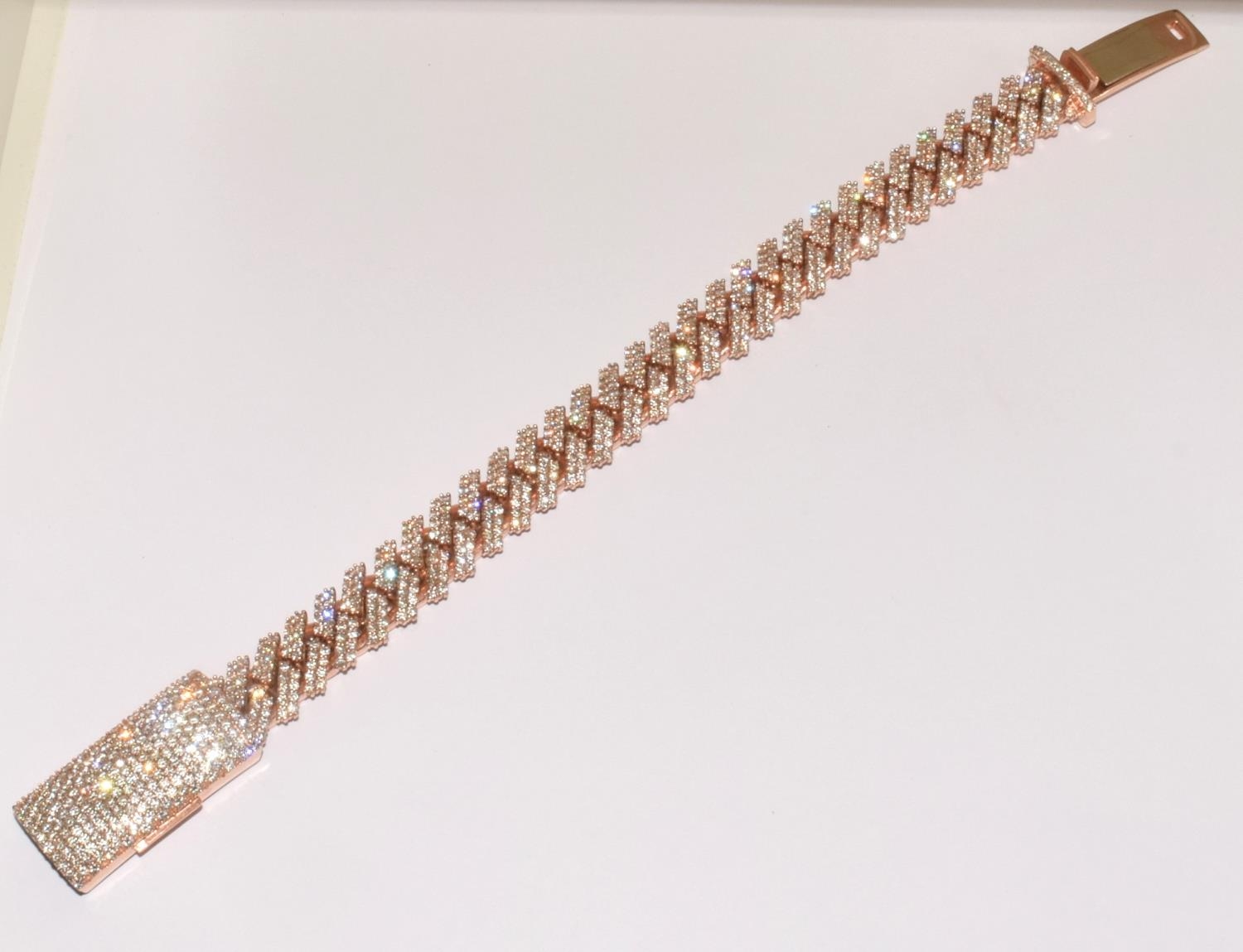 10ct rose gold Diamond encrusted bracelet set with approx 5ct diamonds in a herring bone pattern