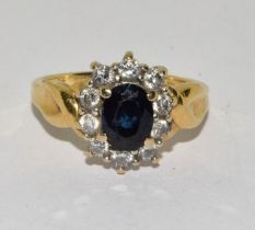 An 18ct gold Sapphire and diamond Princess Diana style ring Size M (boxed)