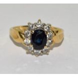 An 18ct gold Sapphire and diamond Princess Diana style ring Size M (boxed)