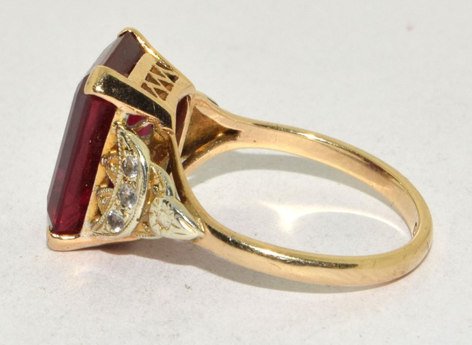 9ct gold ladies Large Ruby square set ring with diamonds to the shank set in an open work setting - Image 2 of 5