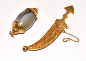 Yellow metal Arabian Knife in a scabbard together an agate yellow metal capped charm