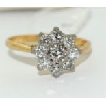 18 ct gold ladies Diamond daisy ring as VS1/SI1 0.65ct size L
