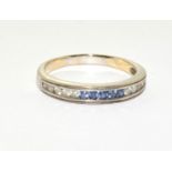 A Sapphire and diamond 18ct gold 1/2 eternity ring Size P