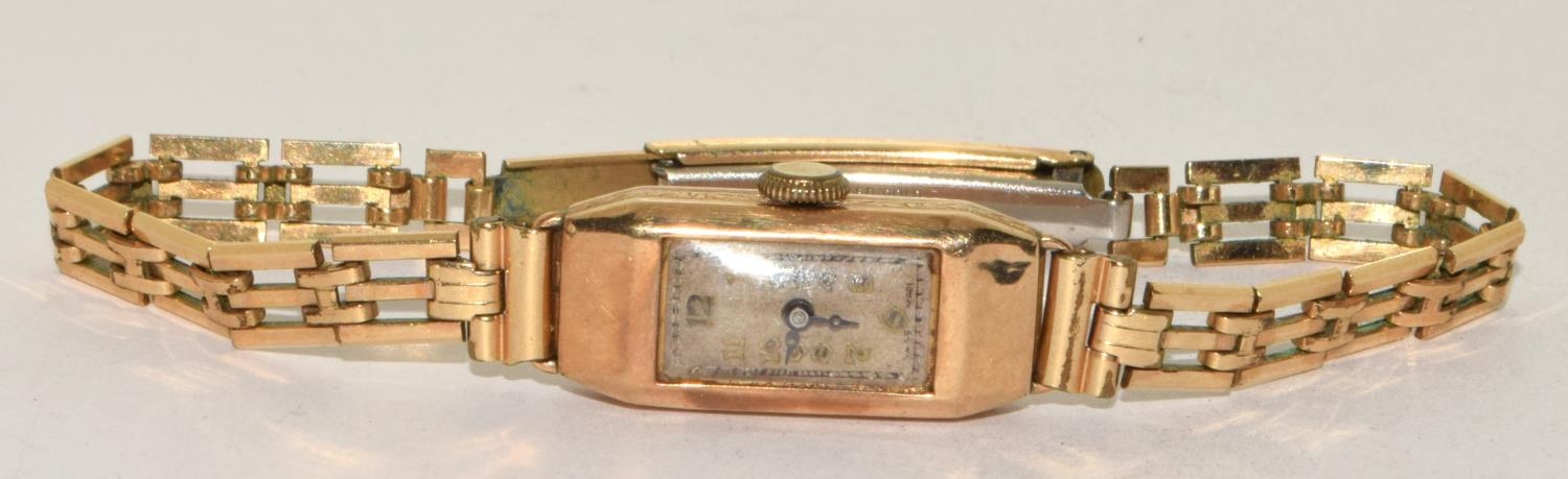 Ladies 9ct gold watch on fancy 3 bar bracelet