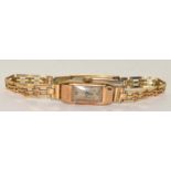 Ladies 9ct gold watch on fancy 3 bar bracelet