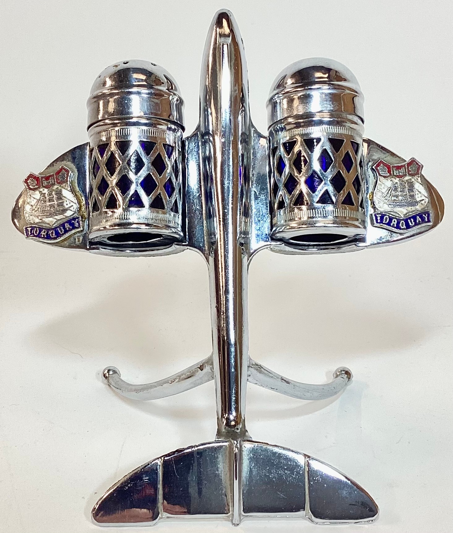 Unusual design silver plate condiment set in the form of an aircraft with blue liners