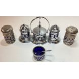 2 x Mixed silver plate condiment sets with blue glass liners