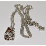 Clagau silver chain with frog pendant containing welsh 9ct gold.