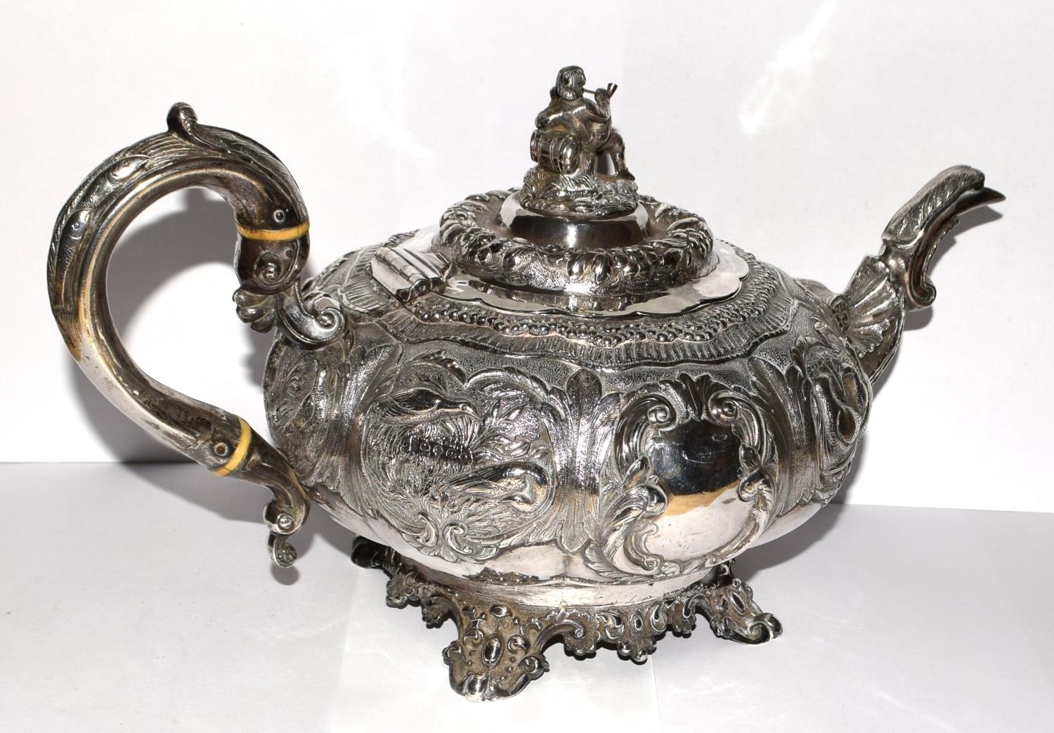 A superb example of a Georgian silver Tea pot heavily embossed with blank cartouche and surmounted - Image 8 of 11