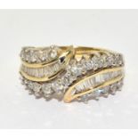 9ct gold ladies Diamond twist ring set with Baggett diamonds K