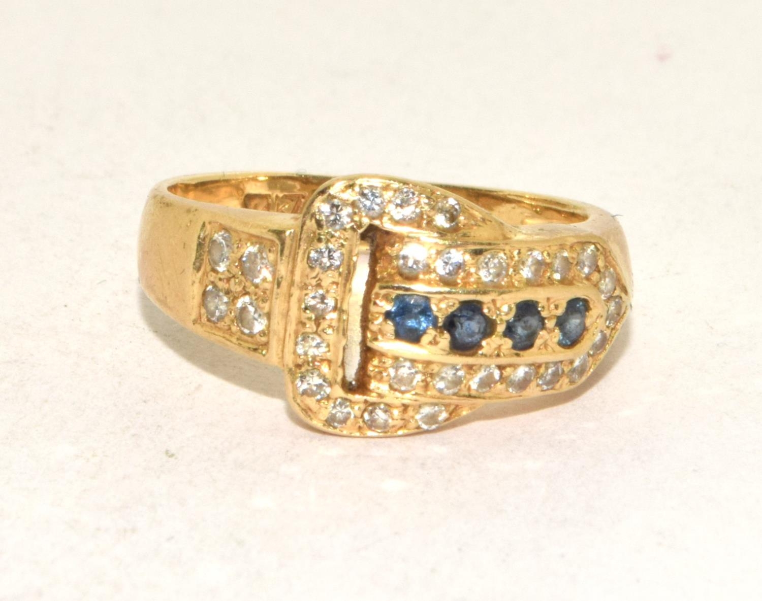 18ct gold Diamond buckle ring set with Sapphires size L