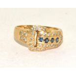 18ct gold Diamond buckle ring set with Sapphires size L