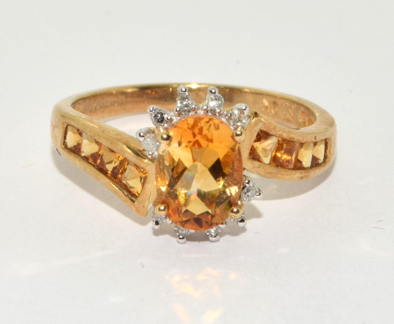 9ct gold ladies Diamond and Amber set ring with amber stones to the shank size P
