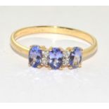 14ct gold ladies 3 stone Tanzanite ring size Q