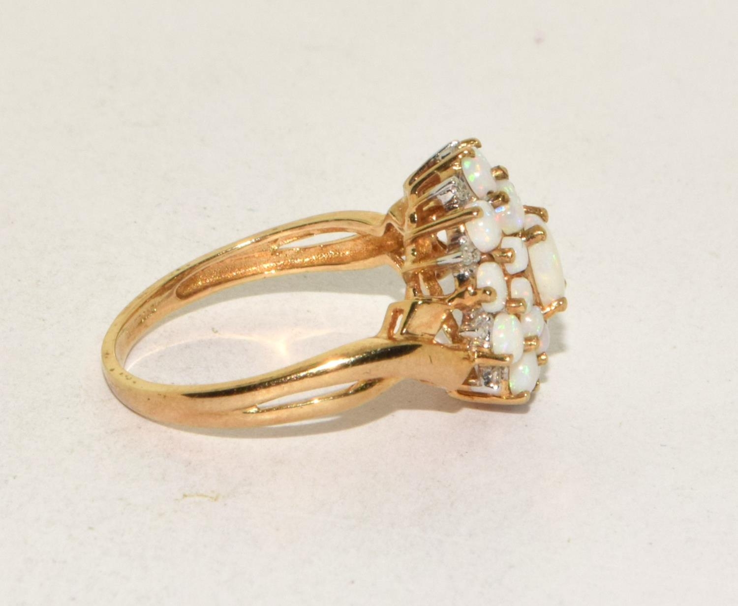 9ct gold ladies Opal and Diamond cluster ring in a good open work mount size N - Image 4 of 5