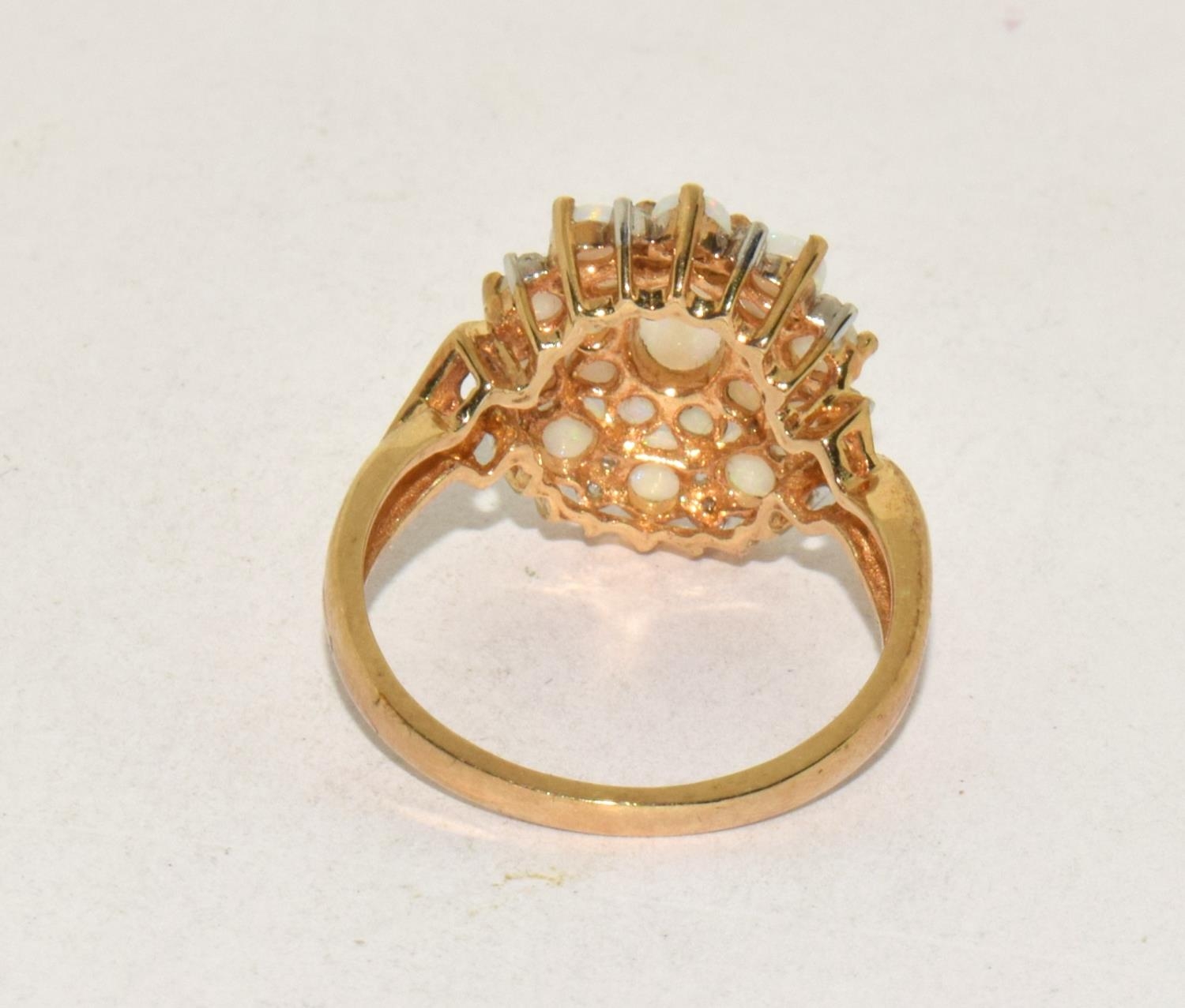 9ct gold ladies Opal and Diamond cluster ring in a good open work mount size N - Image 3 of 5