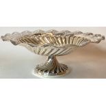 Superb example of a center Table Tasser having a twisted pedestal base and an embossed outer rim