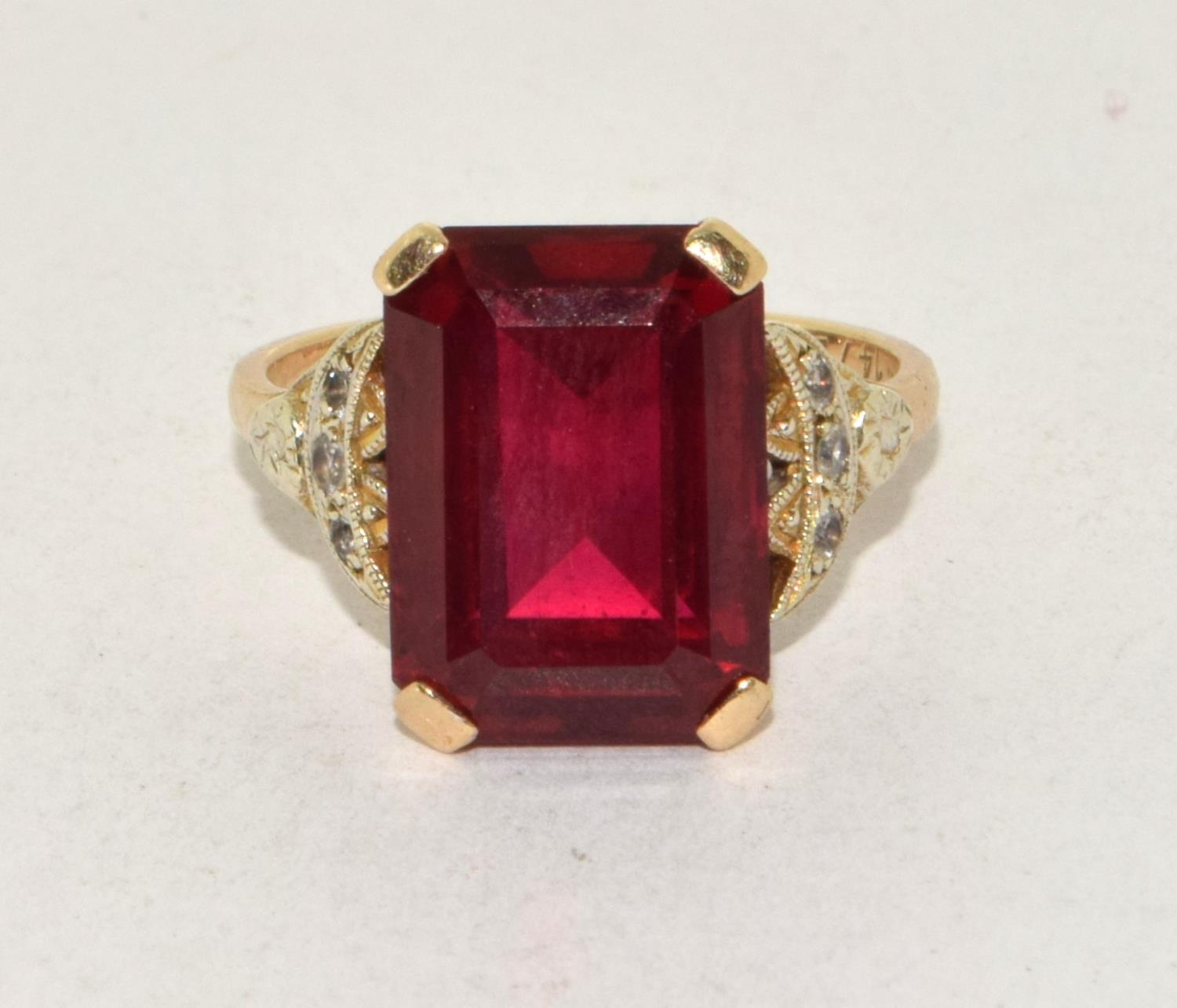 9ct gold ladies Large Ruby square set ring with diamonds to the shank set in an open work setting - Image 5 of 5