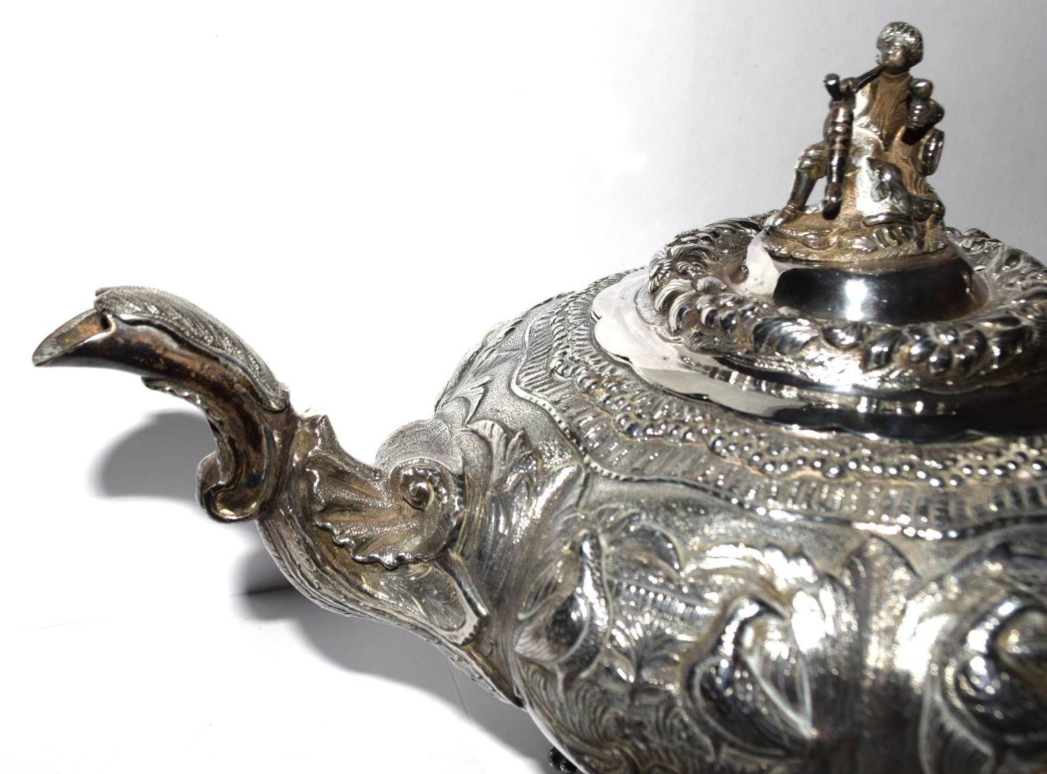 A superb example of a Georgian silver Tea pot heavily embossed with blank cartouche and surmounted - Image 3 of 11