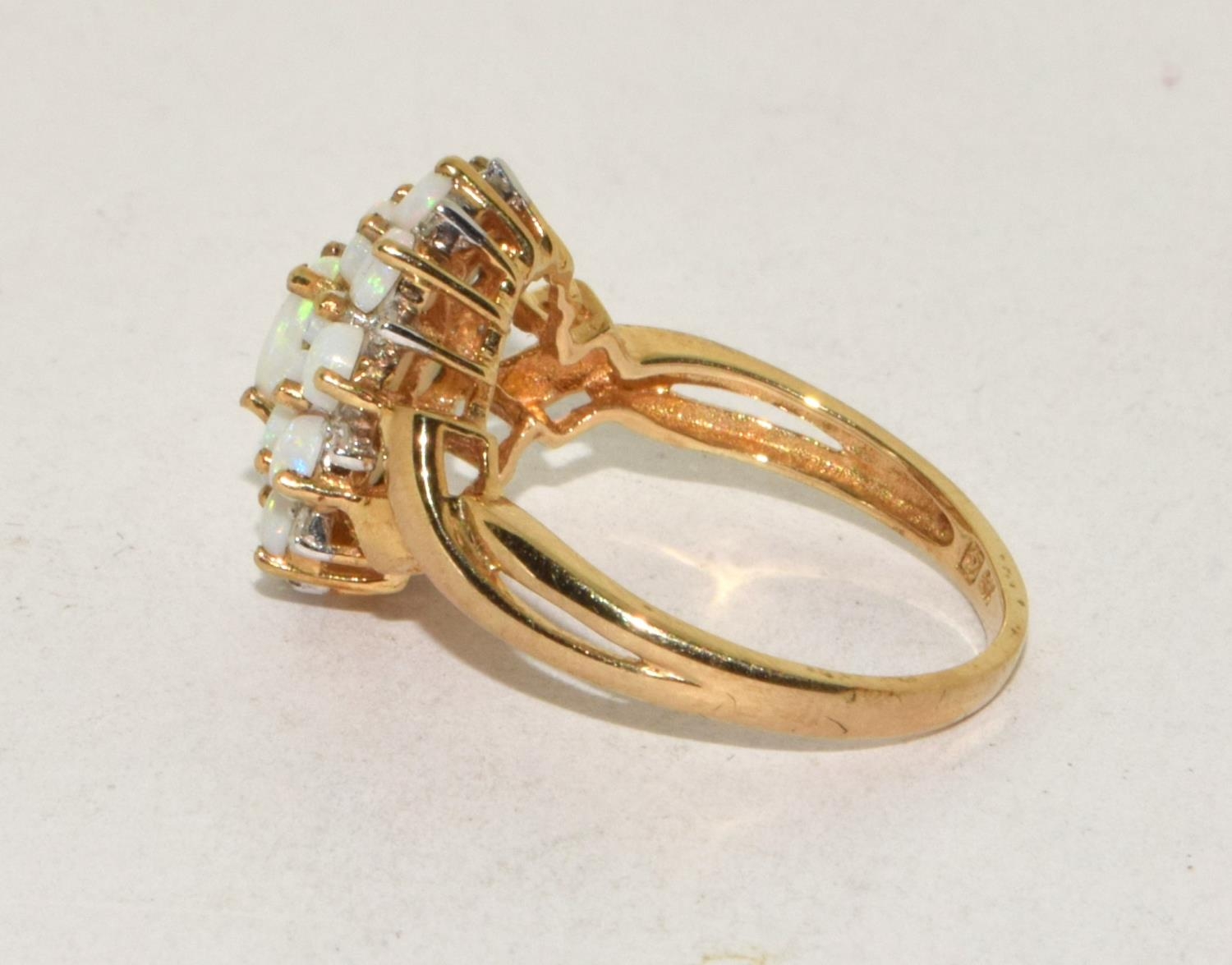 9ct gold ladies Opal and Diamond cluster ring in a good open work mount size N - Image 2 of 5